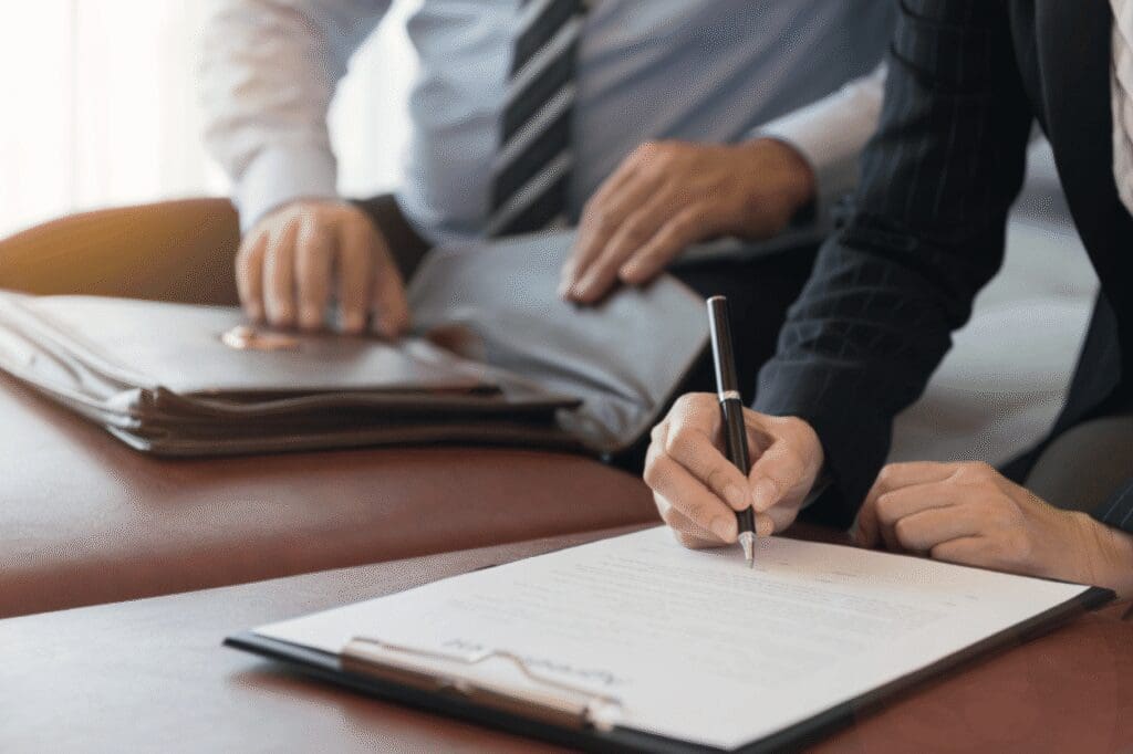 Seller Disclosure Queensland document signing during a property transaction.